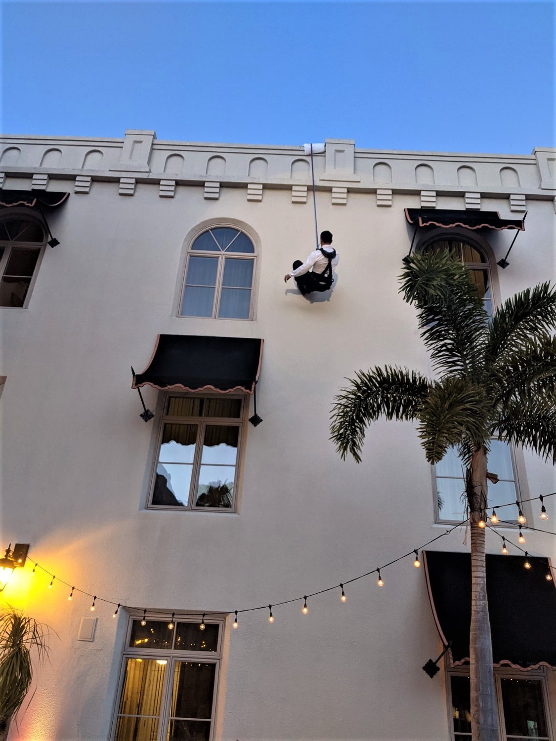 ‘James Bond’ rappels down the side of the Casa Monica at the United Way's 007-themed gala.